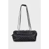 Leather bag decorated with spikes
