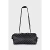 Leather bag decorated with spikes