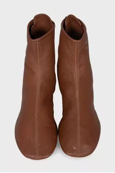 Brown boots with gold logo
