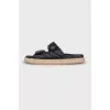 Leather sandals with woven soles