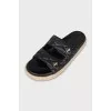 Leather sandals with woven soles