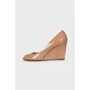 Leather high wedge shoes