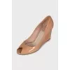 Leather high wedge shoes