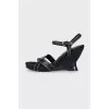 Black wedge sandals