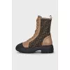 Boots with a signature print