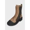 Boots with a signature print