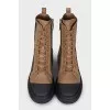 Boots with a signature print