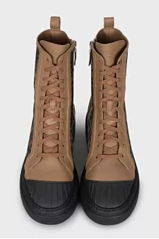 Boots with a signature print