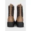 Boots with a signature print