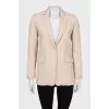 Beige jacket with small print