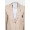 Beige jacket with small print