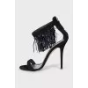 Suede sandals with feathers