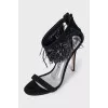 Suede sandals with feathers