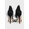 Suede sandals with feathers