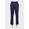Wool trousers with patch pockets and buttons