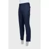 Wool trousers with patch pockets and buttons