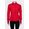 Red shirt decorated with ruffles