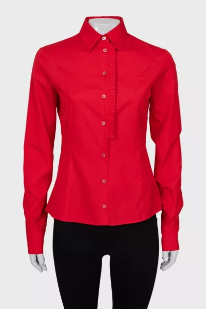 Red shirt decorated with ruffles
