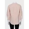 Shirt decorated with inside-out seams