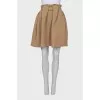 Beige skirt in a relief check