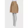 Beige skirt in a relief check