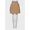 Beige skirt in a relief check