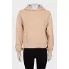 Beige hoodie with embroidery