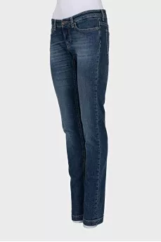 Low rise skinny jeans with distress