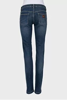 Low rise skinny jeans with distress