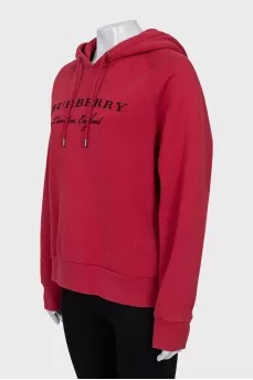 Red hoodie with branded embroidery