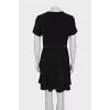 Dress with short sleeves decorated with zippers