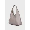 Leather bucket bag with brand logo
