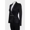 Fitted jacket with an accent button