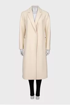 Beige coat with voluminous pockets