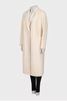 Beige coat with voluminous pockets