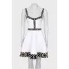 White dress with geometric pattern