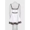 White dress with geometric pattern