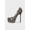 Patent leather shoes with suede heels