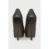 Patent leather shoes with suede heels