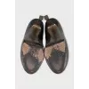 Patent leather shoes with suede heels