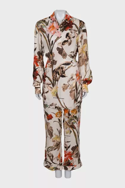 A suit consisting of a tie-up top and trousers