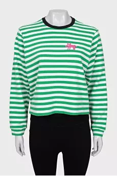 Long sleeve striped shirt decorated with a patch