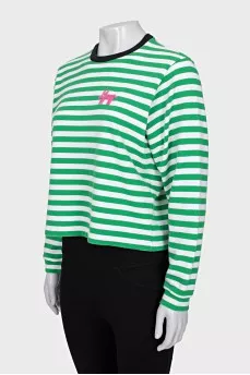 Long sleeve striped shirt decorated with a patch
