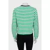 Long sleeve striped shirt decorated with a patch