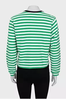 Long sleeve striped shirt decorated with a patch