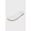 White leather flip flops with tag