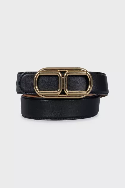 Black leather belt with massive buckle
