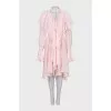 Dress with frills decorated with tassels