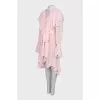 Dress with frills decorated with tassels