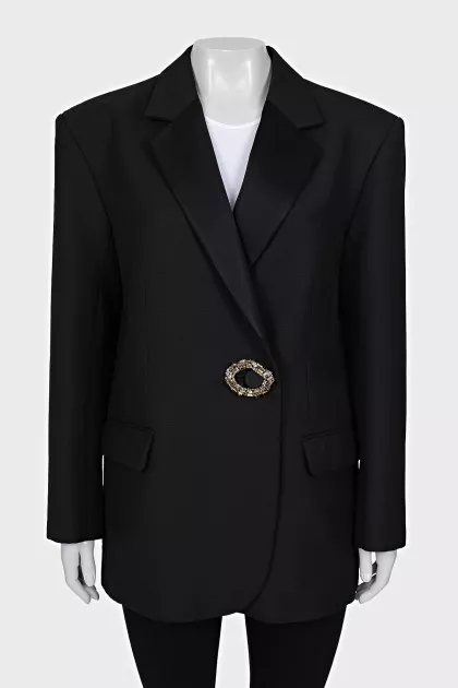 Black jacket with decorated clasp